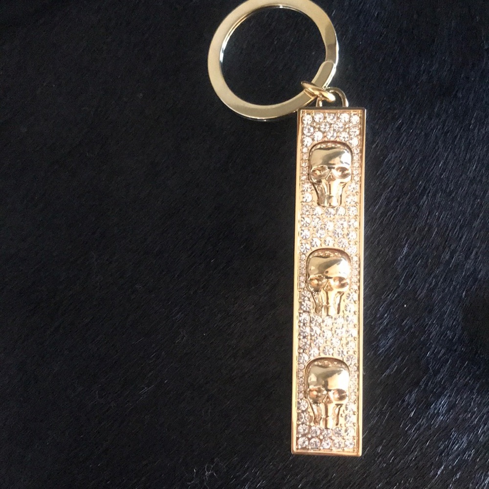 Alexander MQueen gold key chain